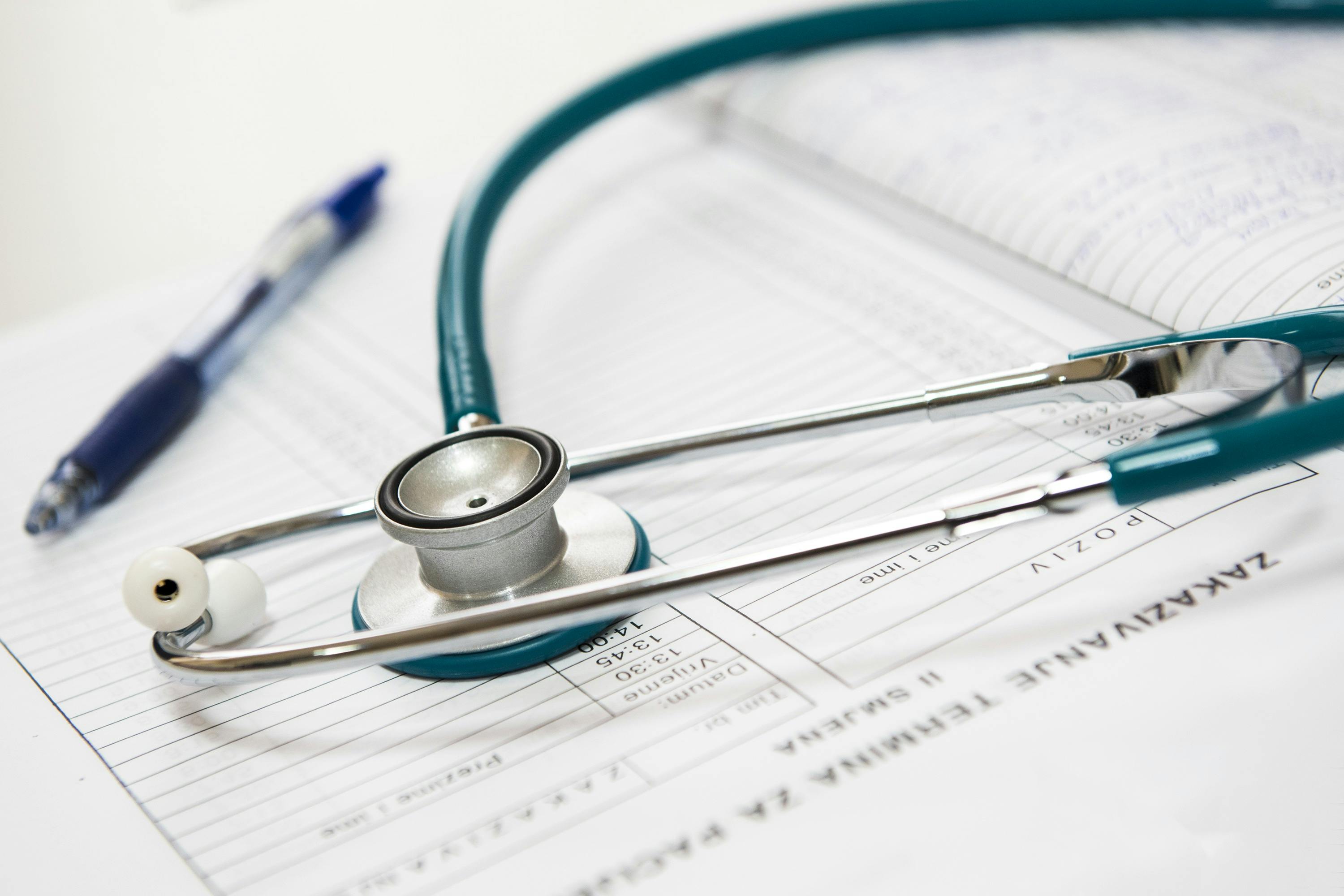 Stethoscope and USCIS Form I-693 for Immigration Medical Exam