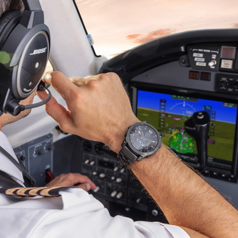 Pilot’s hand on aircraft controls in cockpit during flight – First Class Flight Physical without EKG